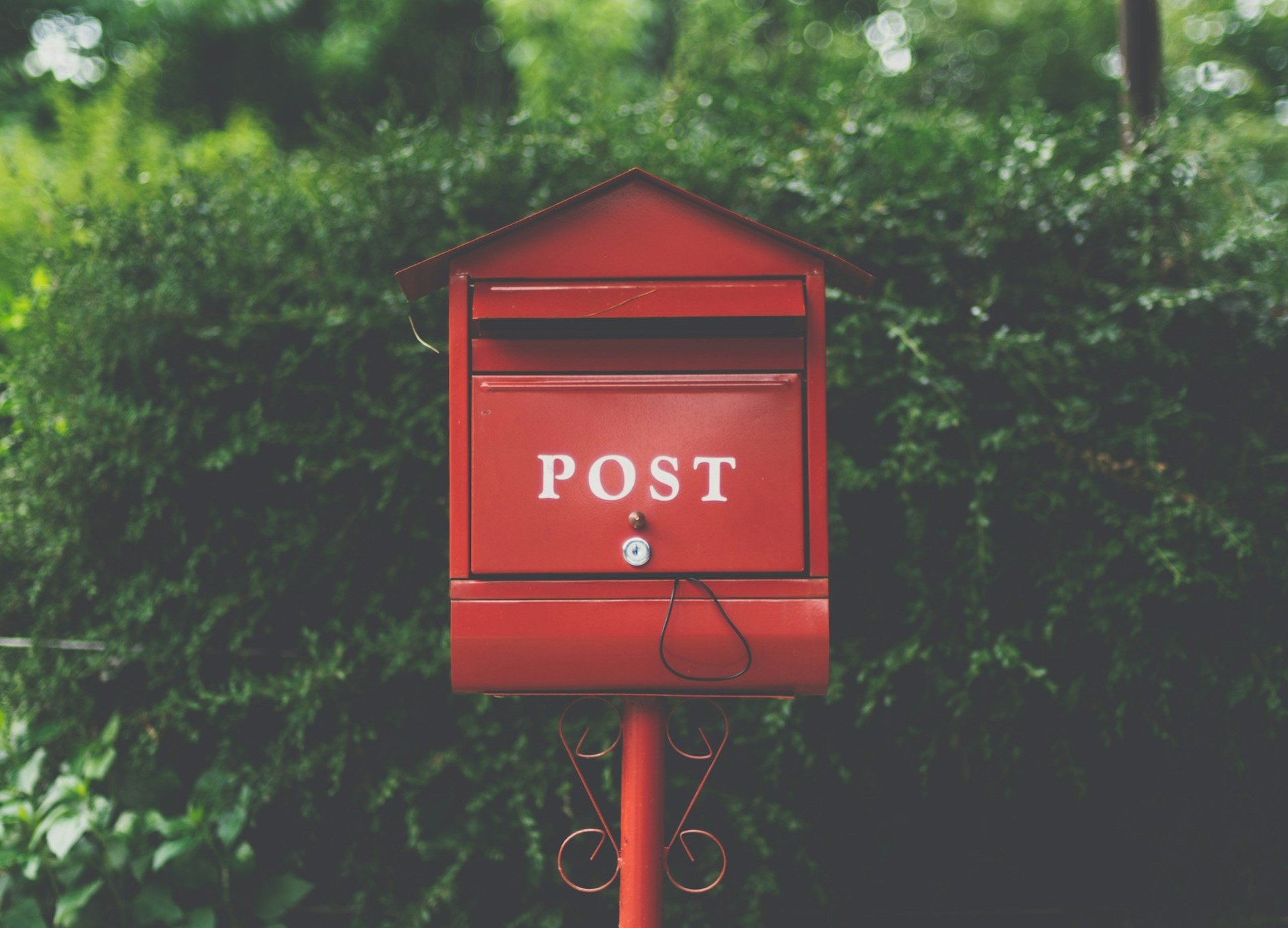 A mailbox with the word 'POST'