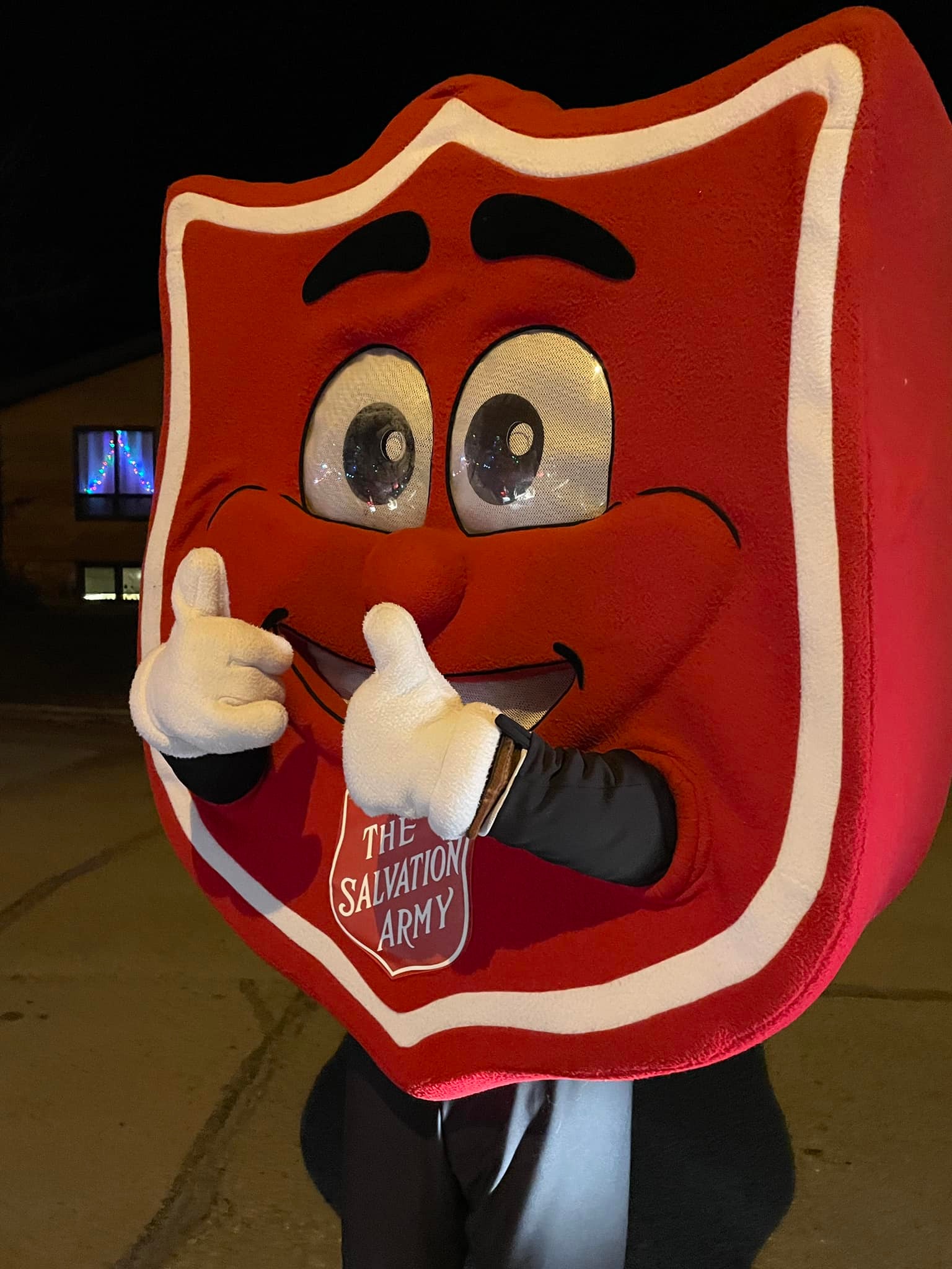 Salvation Army Shield Mascot giving two thumbs up